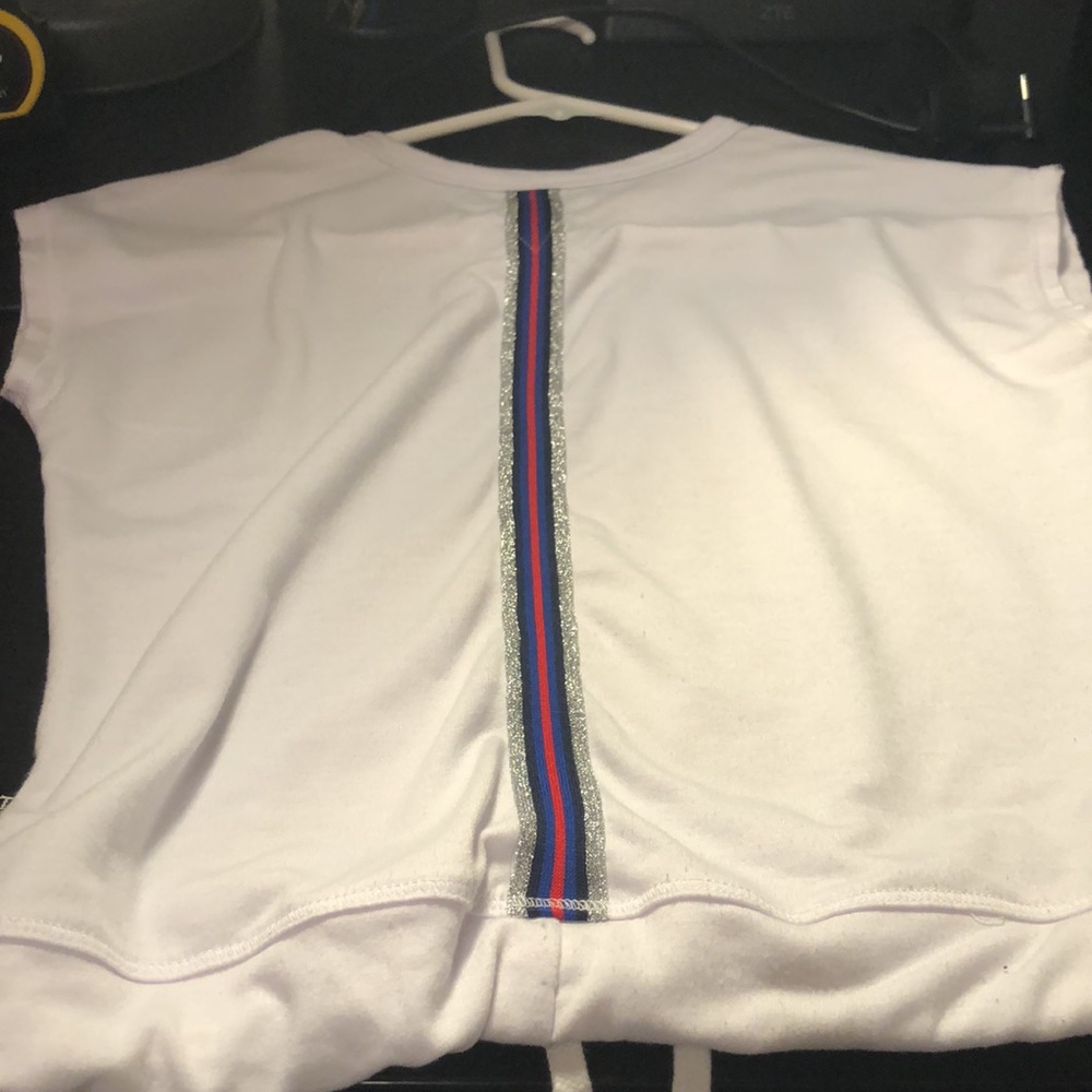 Cute white tee with pretty detailing on the back!